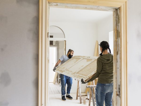 Couple carrying door